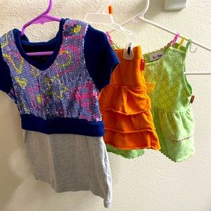 Girls 2 tops ans one skirt lot